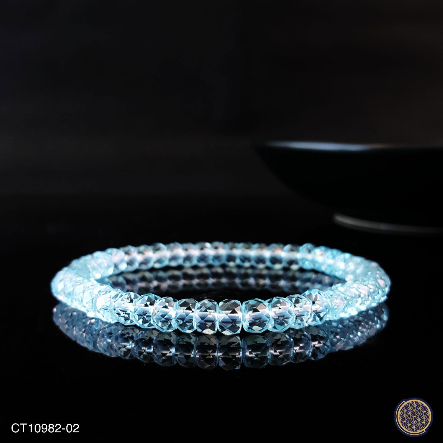 5.5mm High Grade Blue Topaz Stacked Bead Cutting Bracelet
